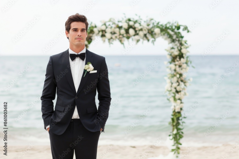 Handsome Groom Standing By Beach Wedding Arch Handsome Groom Standing By Beach Wedding Arch