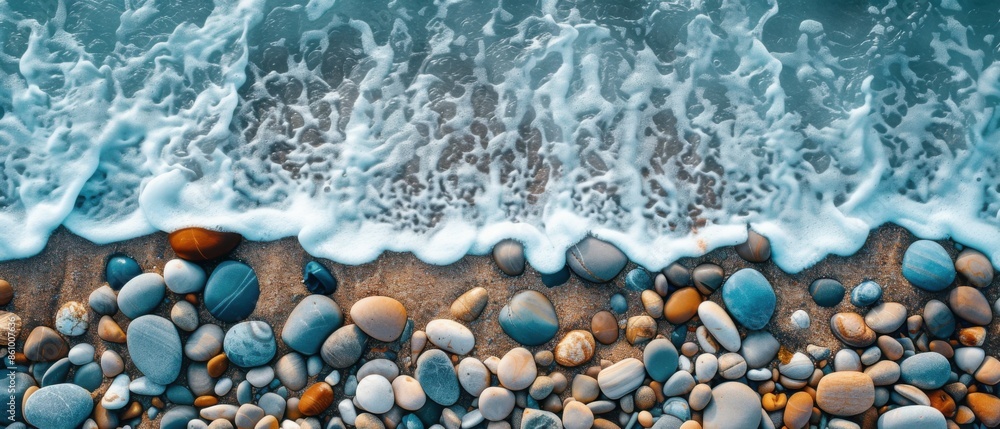 photo of a beach made of smooth stones. water, minimalism photo of a beach made of smooth stones. water, minimalism