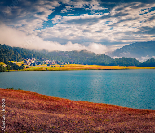 Astonishing summer scene of Sils lake. Foggy morning view of Swiss Alps, Sondrio province Lombardy region, Italy, Europe. Beauty of nature concept background.. photo