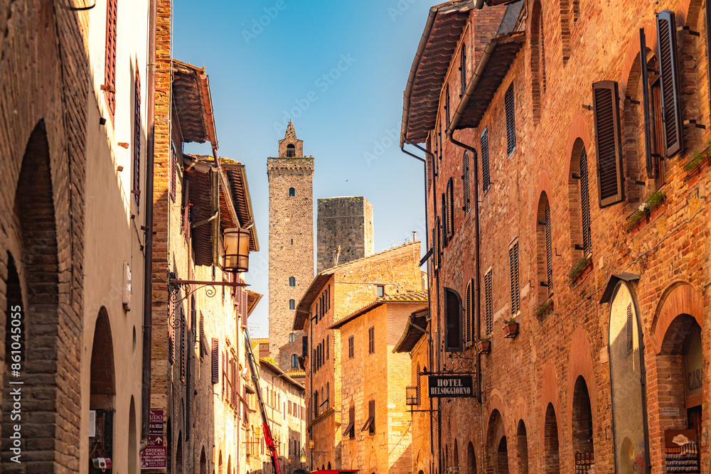 Medieval San Gimignano hill town with skyline of medieval towers, including the stone Torre Grossa. Province of Siena, Tuscany, Italy. Medieval San Gimignano hill town with skyline of medieval towers, including the stone Torre Grossa. Province of Siena, Tuscany, Italy.