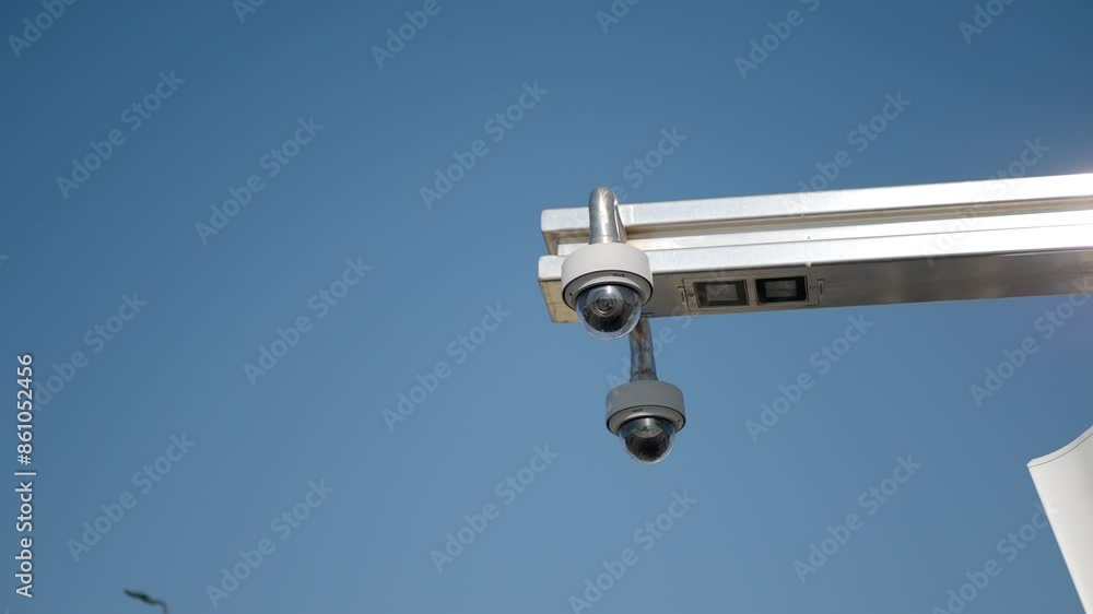 Close-up Of Security Camera On The Street. Close-up Of Security Camera On The Street.
