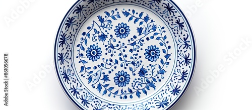 Top view of a collection of vintage handmade ceramic plates or bowls on a gray table, with vibrant colors and a copy space image.