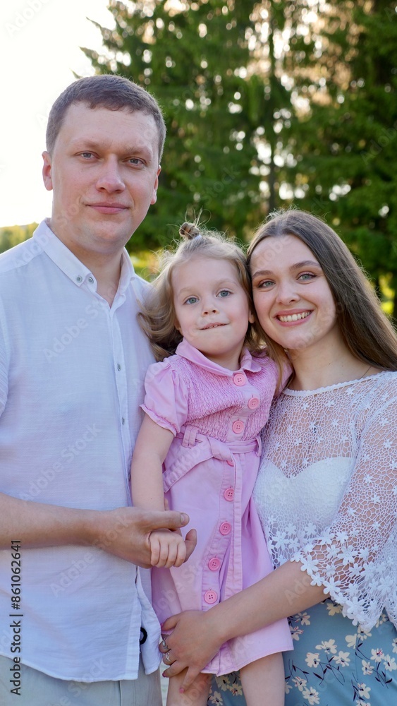 Happy Family in Fathers Day in summer park, Empowered Parenting Happy Family in Fathers Day in summer park, Empowered Parenting