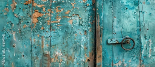 The Old Door with Cracked Paint. with copy space image. Place for adding text or design © vxnaghiyev
