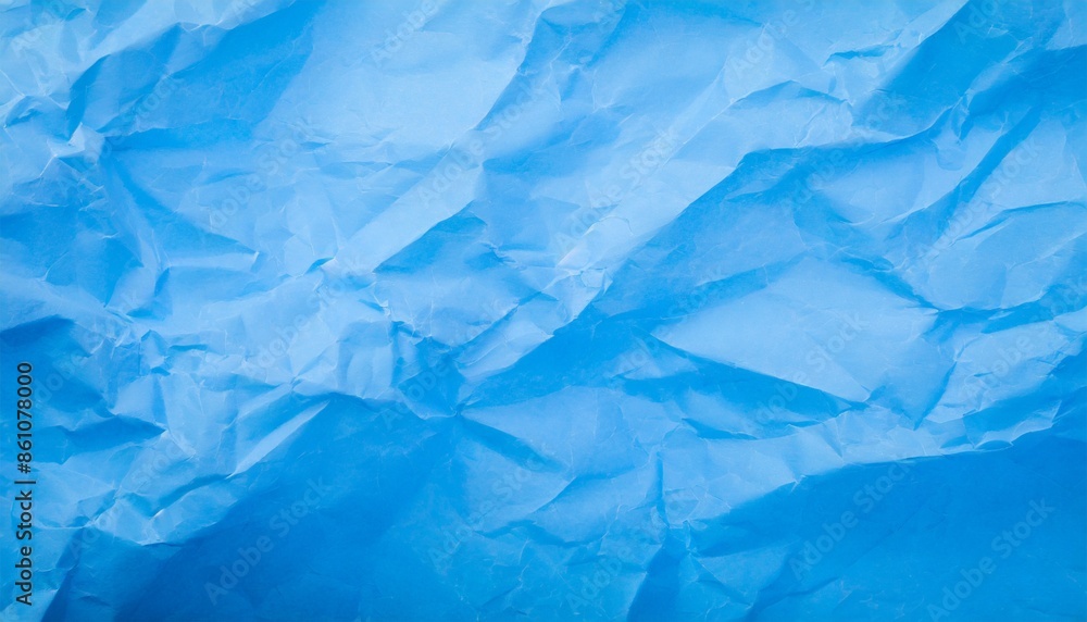 Obraz premium crumpled blue paper texture background