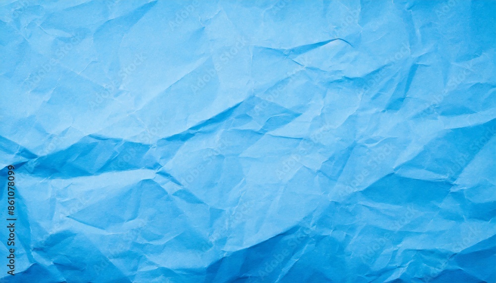 Obraz premium crumpled blue paper texture background