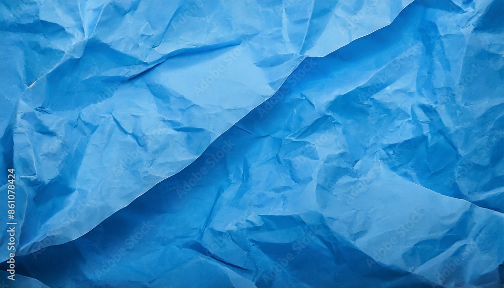 Obraz premium crumpled blue paper texture background