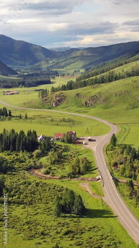 Vertical aerial video of Altai Road Chuya Highway near Seminsky mountain pass. photo