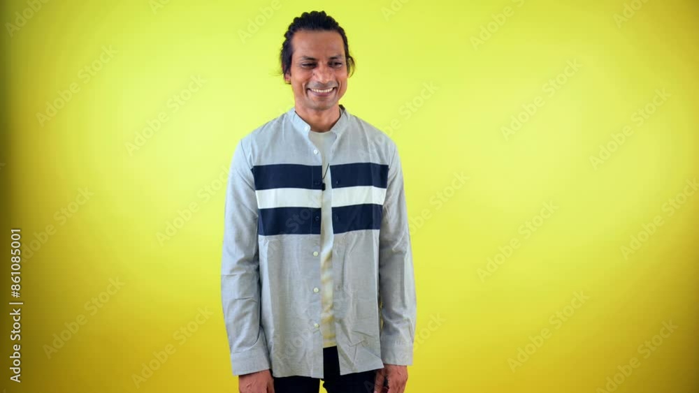 Man smiling with cunning expression Man smiling with cunning expression