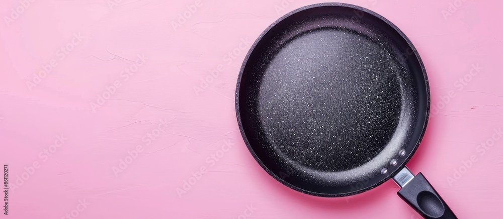 high angle view of the special coating of frying pan pastel background. Copy space image. Place for adding text and design high angle view of the special coating of frying pan pastel background. Copy space image. Place for adding text and design