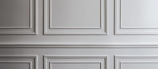 White classic molding in light room with gray matte paneled walls. Copy space image. Place for adding text and design