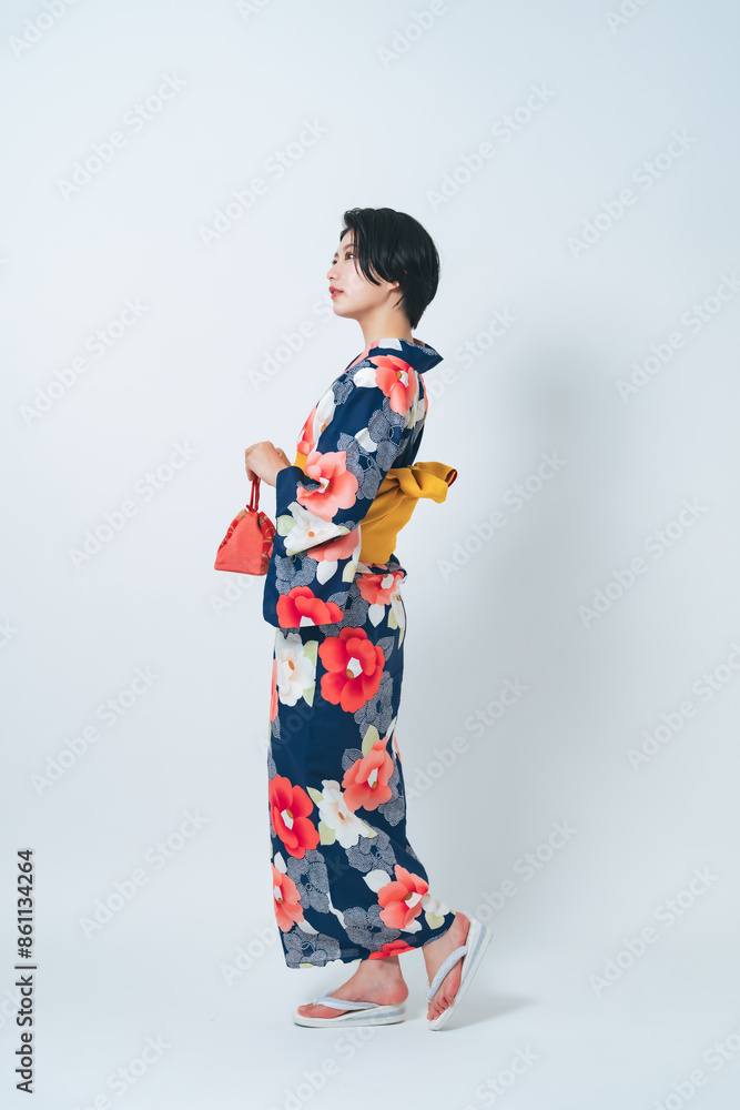 Portrait of young Asian woman wearing Yukata(Japanese traditional summer kimono clothes). Portrait of young Asian woman wearing Yukata(Japanese traditional summer kimono clothes).