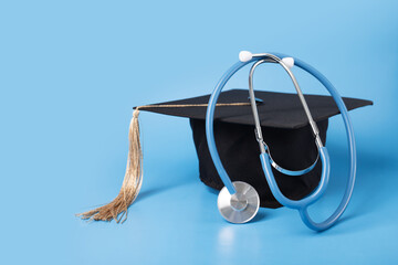Medical education, graduation cap and doctor's stethoscope, graduate with diploma celebrating academic achievement, university ceremony with health professionals