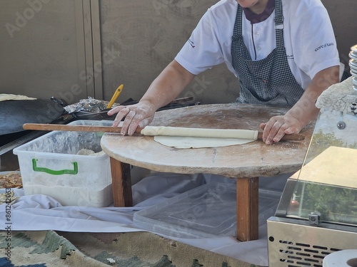 woman making azerbaijan qutab is greens