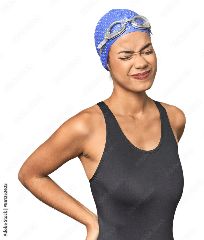 Pro Latina swimmer in studio gear suffering a back pain. Pro Latina swimmer in studio gear suffering a back pain.