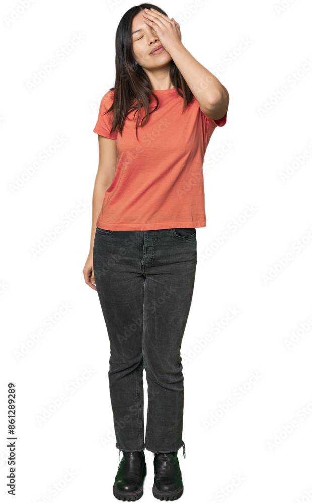 Full-body young Chinese woman laughing happy, carefree, natural emotion. Full-body young Chinese woman laughing happy, carefree, natural emotion.