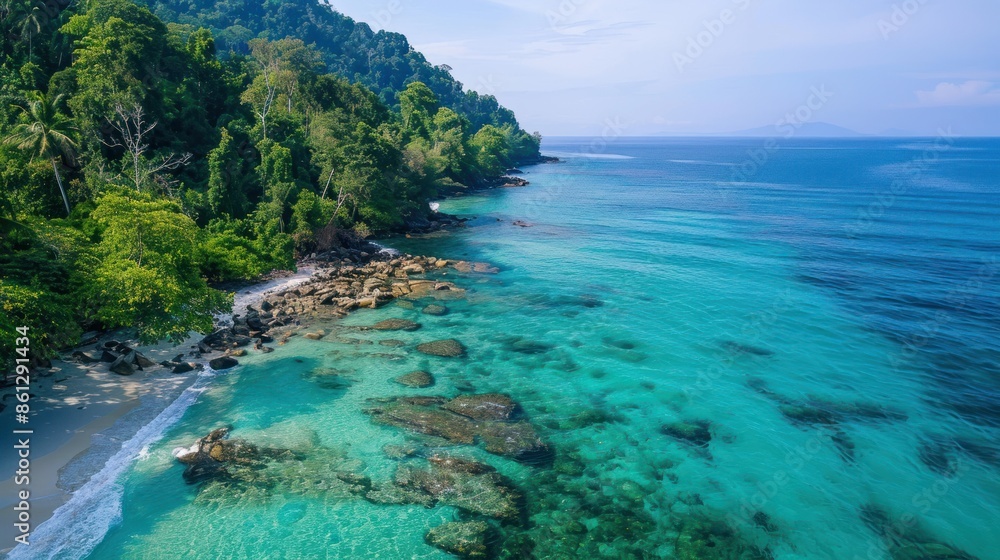 Aerial view of blue ocean waves along the beautiful natural beach of the Andaman Sea. Southern Thailand Aerial view of blue ocean waves along the beautiful natural beach of the Andaman Sea. Southern Thailand