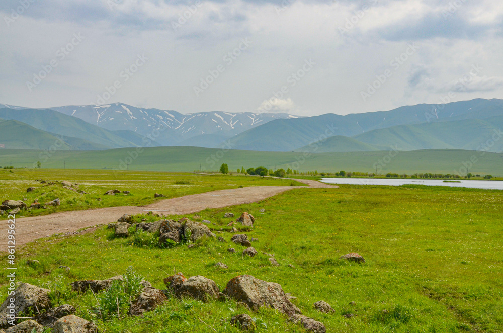 country road in alpine grasslands near Saratovka village (Lori province, Armenia) country road in alpine grasslands near Saratovka village (Lori province, Armenia)