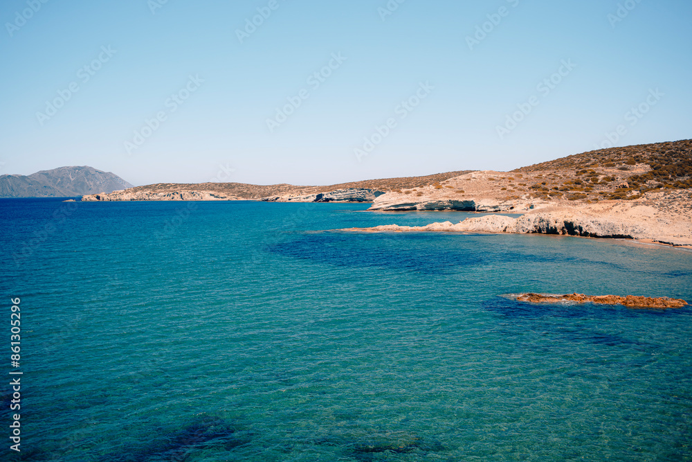 View of a Mediterranean cost with clear water and blue sky in a summer sunny day View of a Mediterranean cost with clear water and blue sky in a summer sunny day