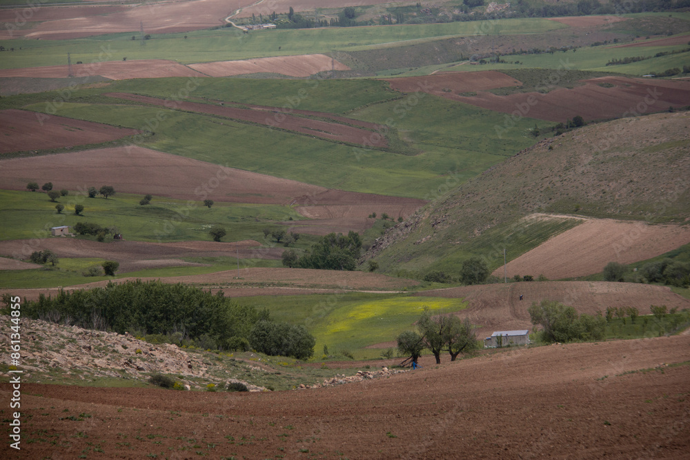 Fototapeta premium Cottages by the garden and beautiful nature around the city of Saqqez, Kurdistan province, Iran