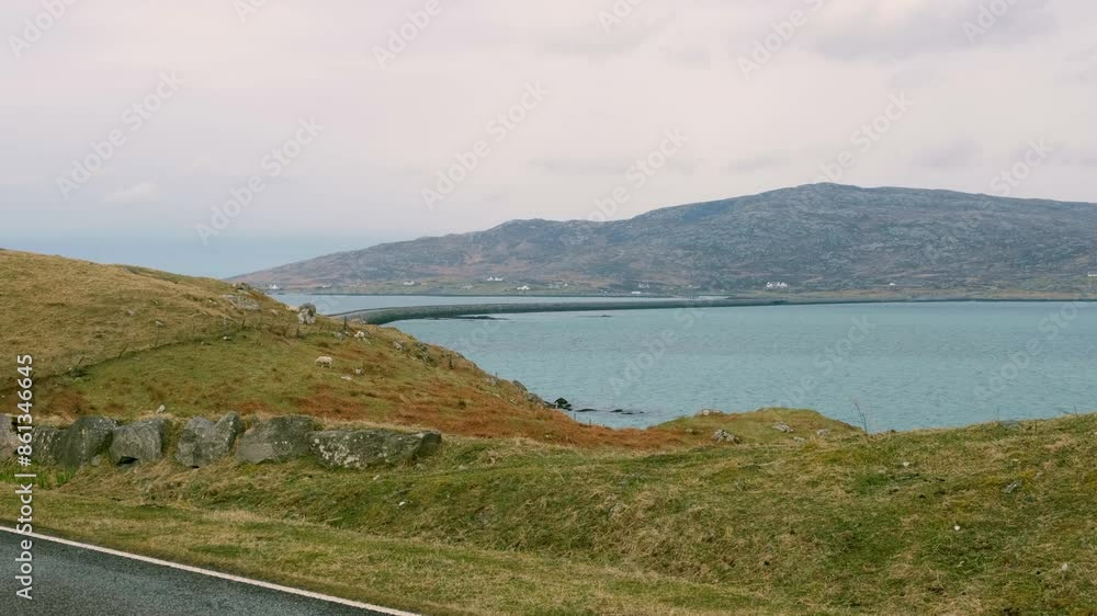 Ocean view overlooking Eriskay Causeway linking the isle of Eriskay with South Uist in the Outer Hebrides of Scotland UK