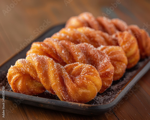 Thai Deep Fried Dough Twists with Sugar Coating Crispy and Sweet Thai Donuts Authentic and Delicious Thai Dessert Recipe for Crunchy, Sugary, Twisted Snacks Perfect Thai Sweet Treats