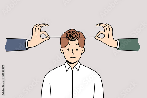 Problems with psychological health in man with tangled threads on head and hands of friends trying to untangle lump. Psychological disorder and insanity in business guy in need of psychotherapist