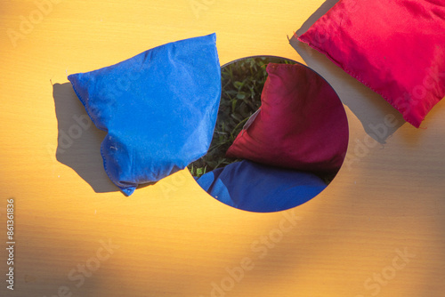 Corn hole selective focus copy space background image fun outdoor games, natural authentic light, playing a game