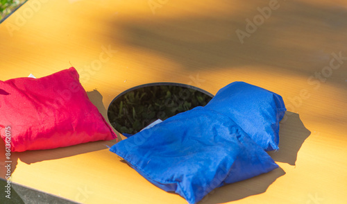 Corn hole selective focus copy space background image fun outdoor games, natural authentic light, playing a game