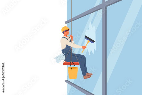 Industrial climber washes windows of skyscraper using brush and bucket of water, hanging at high altitude on rope. Dangerous work of industrial climber removing dirt from walls of high-rise buildings
