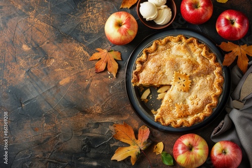 Top view of delicious homemade apple pie with cut slice, fresh apples, peel and ice cream on brown rustic stone background, space for text. Autumn or Thanksgiving concept, baked apple pie for dessert photo