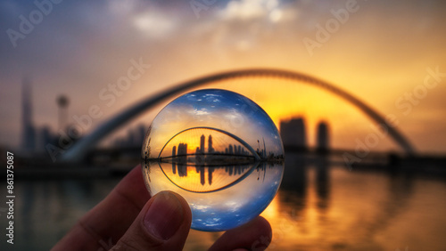 Wallpaper Mural hand holding a small glass ball  Torontodigital.ca