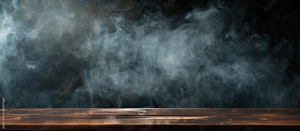 Copy space image: Wood table on black backdrop with smoke rising, perfect for showcasing products. Copy space image: Wood table on black backdrop with smoke rising, perfect for showcasing products.