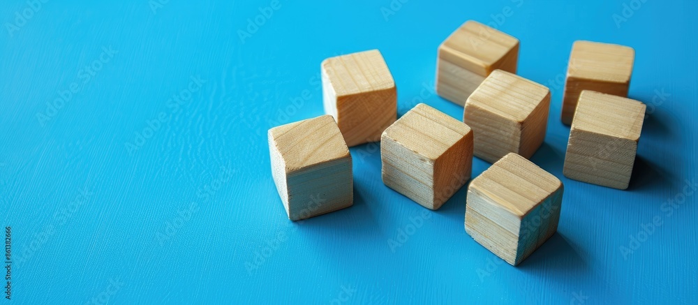 Obraz premium Wooden cubes with 'success process' on a blue background, ideal for a success business process image with space for text. copy space available