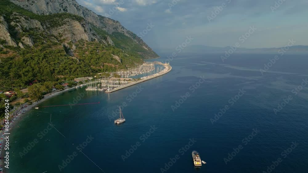 Beautiful view of the beach with boats, pure nature, sea and ships. Shot from a drone Beautiful view of the beach with boats, pure nature, sea and ships. Shot from a drone