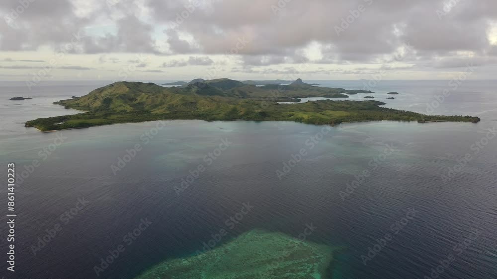 Cumulus clouds over Fiji Islands. Drone video of ocean turquoise waters. Vacation and travel concept. Cumulus clouds over Fiji Islands. Drone video of ocean turquoise waters. Vacation and travel concept.