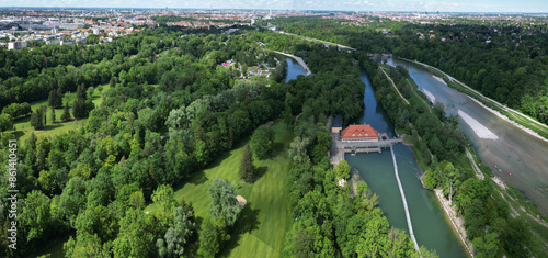 The Isar river flows into the city of Munich aerial view