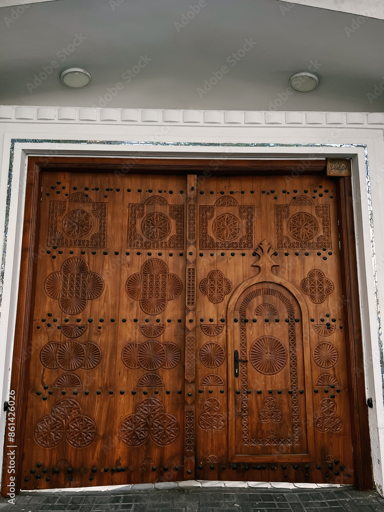 luxury wooden large doors with engraving