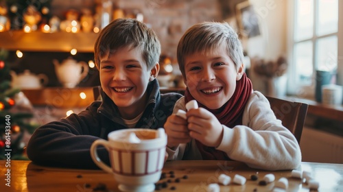 Two cheerful boys sit together in a cozy, festive room, holding mugs of hot cocoa with marshmallows, enjoying the warmth and joy of the moment.