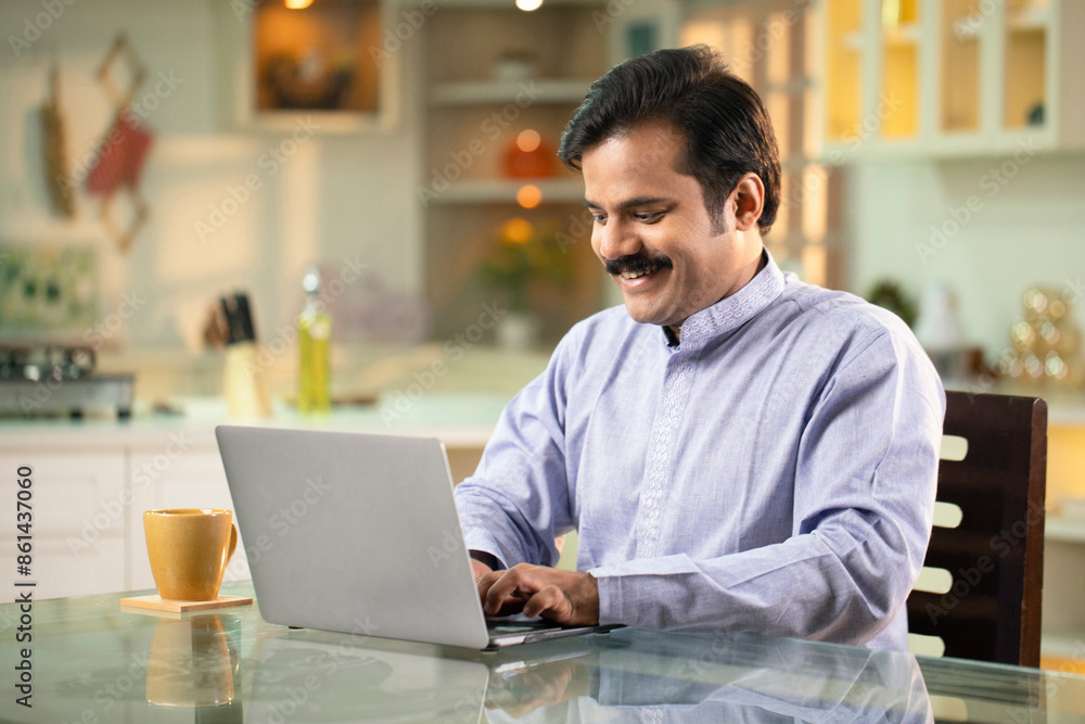 Indian Mustache Man Working On Laptop At Home Indian Mustache Man Working On Laptop At Home