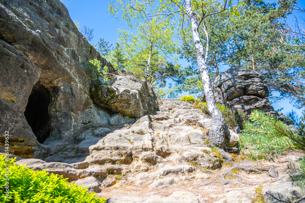 The Drabovna sandstone carved chamber near Kozakov Mountain in Czechias Bohemian Paradise is a must-see for hikers and nature lovers. The Drabovna sandstone carved chamber near Kozakov Mountain in Czechias Bohemian Paradise is a must-see for hikers and nature lovers.