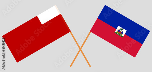 Crossed flags of Abu Dhabi and Republic of Haiti. Official colors. Correct proportion