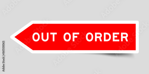 Red color arrow shape sticker label with word out of order on gray background