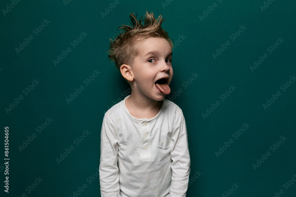 Young Boy Making Funny Face With Tongue Out Young Boy Making Funny Face With Tongue Out