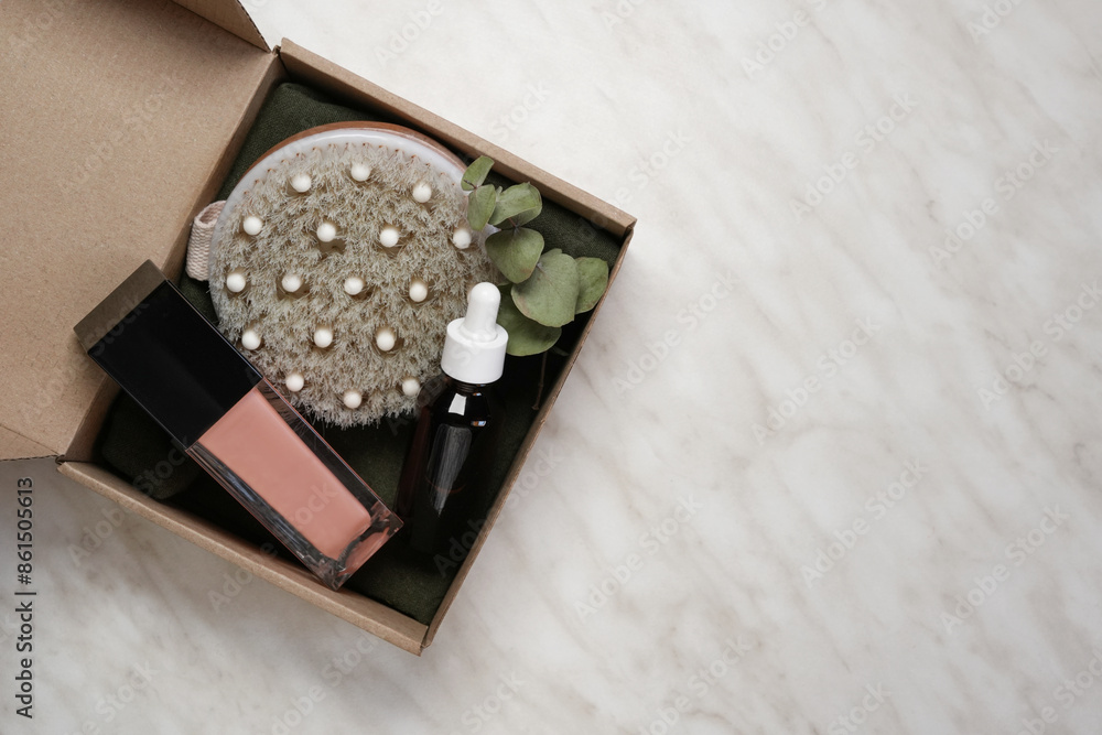 Gift box with cosmetic products on pastel marble table. Body treatment, skincare. Concept of sale, gifts on Valentines day or mother day. Top view, flat lay. Space for text. Gift box with cosmetic products on pastel marble table. Body treatment, skincare. Concept of sale, gifts on Valentines day or mother day. Top view, flat lay. Space for text.