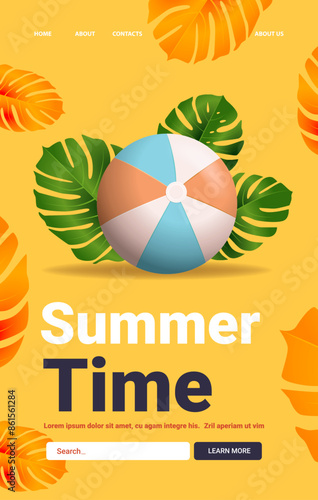 Beach ball tropical leaves yellow background summer theme