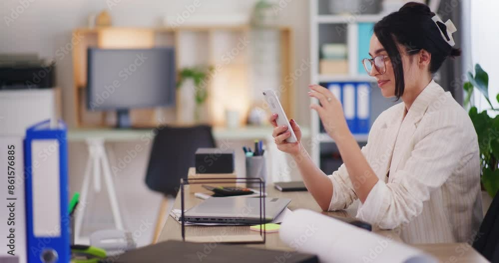 Satisfied Employee Browsing Smartphone in Office Satisfied Employee Browsing Smartphone in Office