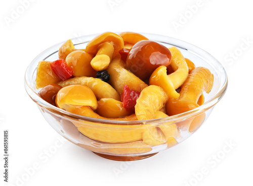 Glass bowl with pickled honey mushrooms  isolated on white background. With clipping path.
