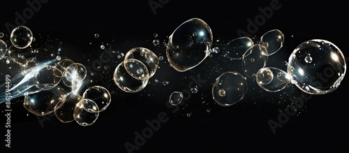 Soap bubbles creating a frothy image with a dark background for copy space.