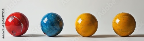 Set of bocce balls with pallino, white backdrop, rule of thirds, copy space photo